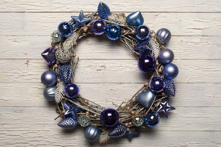 decorative wreath with blue and gray balls on white backgroundの写真素材