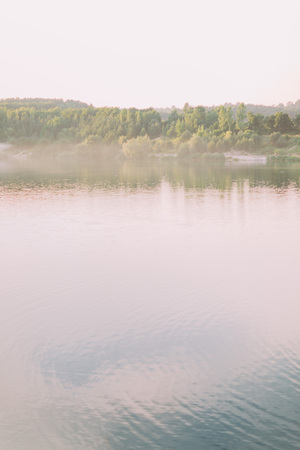 The vertical view of the landscape consisted of the river and forestの写真素材