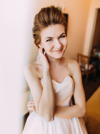 The vertical portrait of the smiling bride.の写真素材
