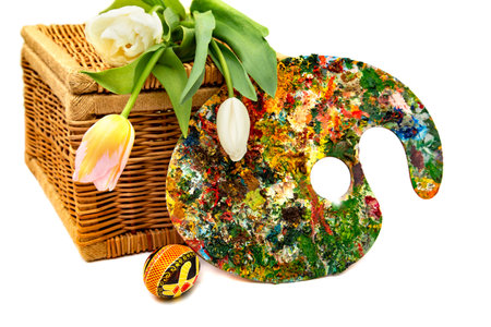 Easter eggs with tulips on a white background, easter holiday concept.