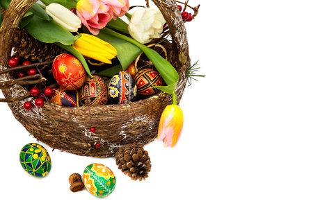 Spring greeting card. Easter eggs in wooden basket. Spring flowers tulips. holiday, easter...