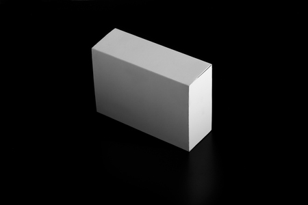 carton moving box. white Cardboard box isolated on blackの写真素材