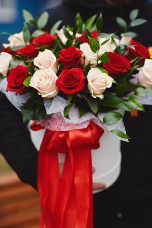 Bouquet of the bride. Colorful stylish wedding bouquet of flowers lies on the brown background.