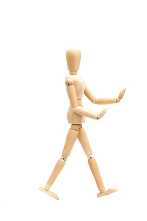 wooden doll in different poses.の写真素材