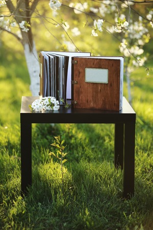 wooden photobook on the tableの写真素材
