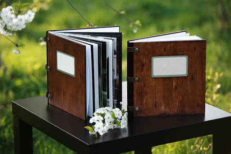 wooden photobook on the tableの写真素材