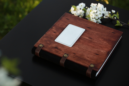 wooden photobook on the tableの写真素材