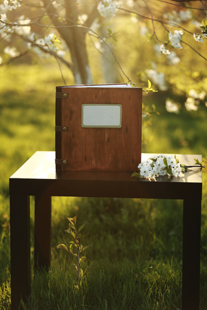 wooden photobook on the tableの写真素材