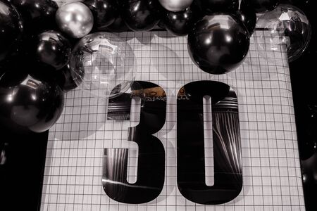 birthday thirtieth anniversary decoration with black and silver balloonsの写真素材