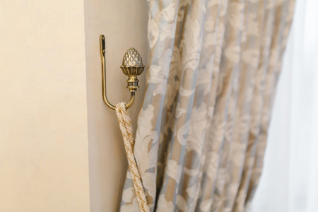 Holder for room curtains. Fragment photo curtain, interior detail, curtain detail close up,の写真素材