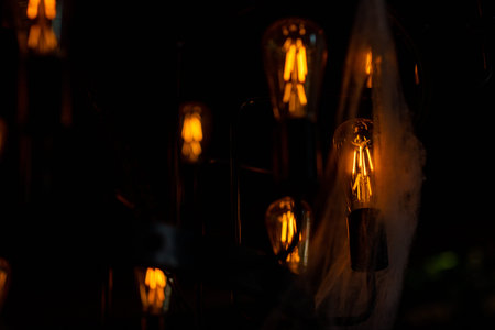 Glowing vintage lamp with retro light bulbs. Lighting decor close-up
