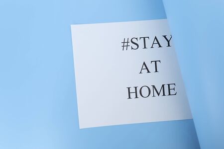 stay at home concept. paper with words stay at home isolated on white background. Coronavirus, COVID-19, self-quarantine, isolation.の写真素材