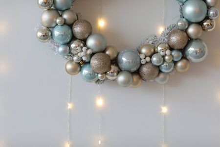 White Christmas background. White Christmas wreath on white background. Copy space. selective focusの写真素材