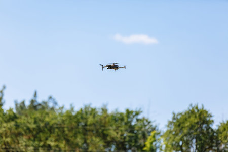 drone quad copter on green corn field.