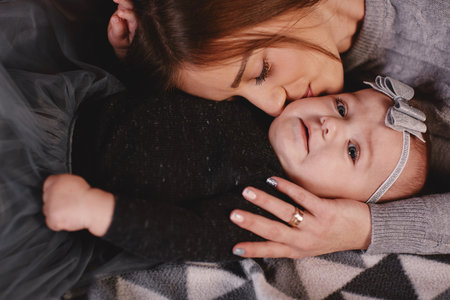 Happy loving family. Mother and her daughter child girl playing and hugging. happy mother hugging...
