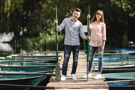 Loving young couple is having fun outdoors. Love and tenderness, dating, romance, family concept.