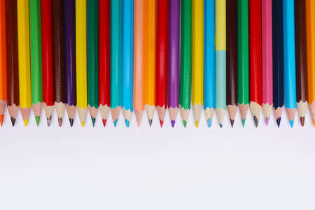 Color pencils set, row wooden color pencils isolated on white background. colored pencils for drawing. copy space.の写真素材
