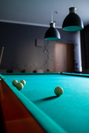 Playing billiard. Billiards white balls on green billiards table. Billiard sport concept. Pool...