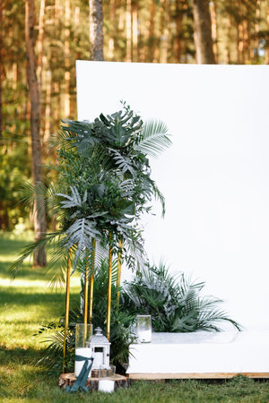 Wedding decorations in luxury ceremony. Arch for wedding ceremony a is decorated with flowers and...