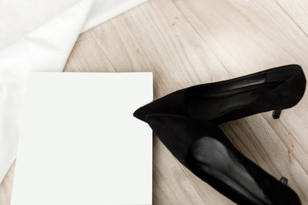 business woman accessories. black high heels and magazine mock up.