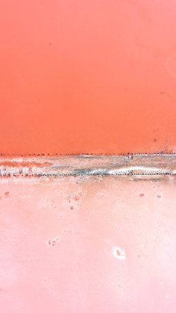 Aerial view of salt lake with pink water, lagoon Sivash, Ukraine, recreation place. Lake naturally...