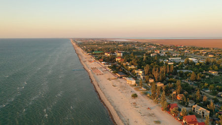 Panorama of sea shore in South Ukraine, Europe. Resort city with nice sandy beach and clear blue sea. travel destination, ideal place for comfort vacation on black sea. Drone photo.の写真素材