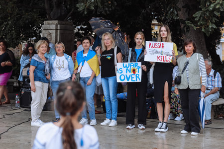 Valencia, Spain. September 18, 2022: Meeting, Ukraine War Protest. Protest against Russian invasion of Ukraine. Some Ukraine Anti War sings and banners, war is not over, Russia kills,Putin terroristのeditorial素材