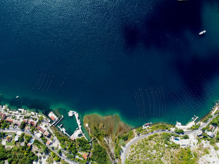 Aerial drone high view of Kotor bay, Boka Kotorska and coastal town Kotor, Cattaro, in Montenegro. Location place famous resort Montenegro. Adriatic fjord surrounded by rugged mountains.の写真素材