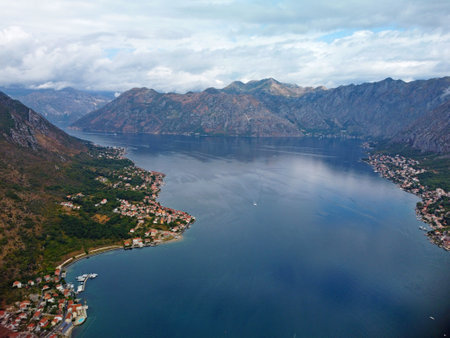 Aerial drone high view of Kotor bay, Boka Kotorska and coastal town Kotor, Cattaro, in Montenegro. Location place famous resort Montenegro. Adriatic fjord surrounded by rugged mountains.の写真素材