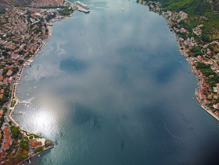 Aerial drone high view of Kotor bay, Boka Kotorska and coastal town Kotor, Cattaro, in Montenegro. Location place famous resort Montenegro. Adriatic fjord surrounded by rugged mountains.の写真素材