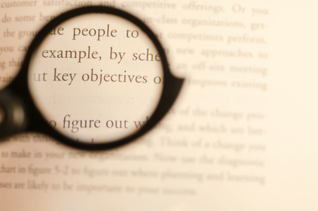 Business study text focused by lens on key objectives with blurred backgroundの写真素材