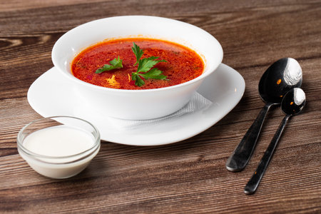 Borsht, bortsch, borshch, borscht. Soup, associated with cuisine of Eastern and Central Europe,...