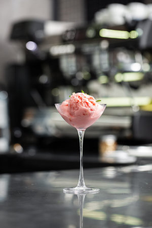 glass of ice cream scoops, top view with copy space. Close Up Still Life of Scoops of berries Ice...