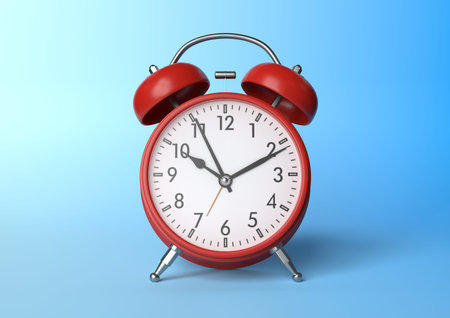 Red vintage alarm clock on bright blue background in pastel colors. Minimal creative concept. Front...