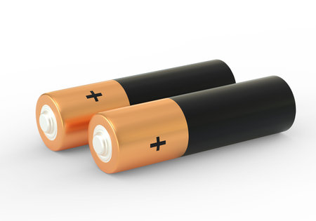 Two AA size batteries isolated on white background close up, carbon zinc batteries, rechargeable...