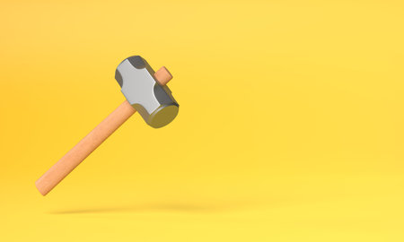 Flying hammer on yellow background with copy space. Anvilhammer. hammertool. creative minimal concept. 3d renderingの写真素材