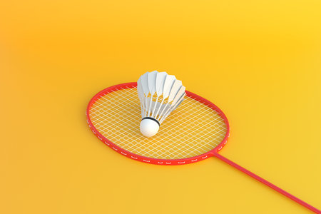 Badminton racket and shuttlecock on yellow background. 3d rendering illustrationの写真素材