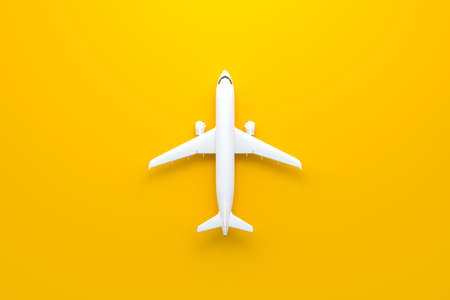 Airplane on a yellow background with copy space. Minimal style design. top view. 3d rendering illustrationの写真素材