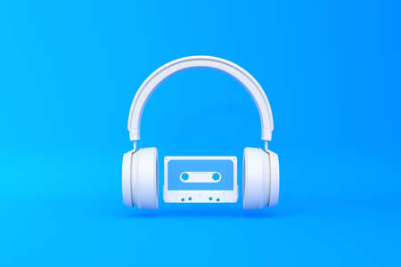 Wireless headphones with audio cassette on a blue background. front view. 3d rendering illustrationの写真素材