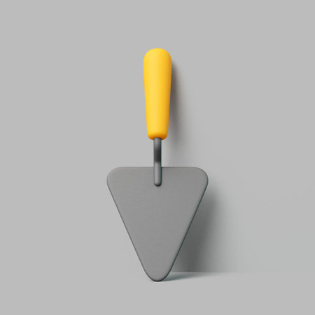 Realistic 3D render of a triangular metal masonry trowel with yellow handle isolated on gray background. Construction hand tool conceptの写真素材