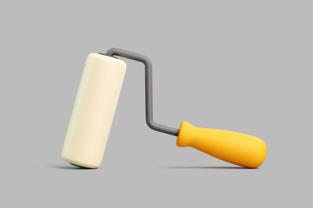 Realistic 3D paint roller with yellow handle on gray background, side viewの写真素材