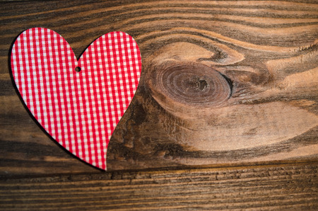 Heart on a natural wooden texture for Valentine's Dayの写真素材