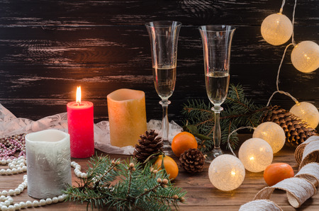 Christmas and New Year celebration with champagne. New Year holiday decorated table.の写真素材