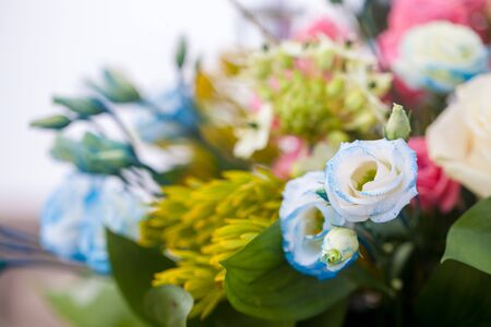 Colorful bridal bouquet with blue rosesの写真素材
