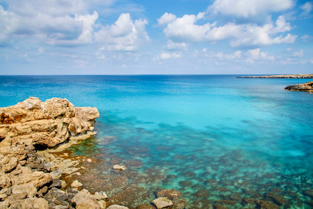 Beautiful landscape at Cavo Greco in Ayia Napa, Cyprus island, Mediterranean Sea. Amazing blue  sea during a sunny day.の写真素材