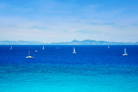 Windsurfers on the sea shore Greece, Rhodes island . Surfers in the background of mountains in the distance. Summer sunny day.の写真素材