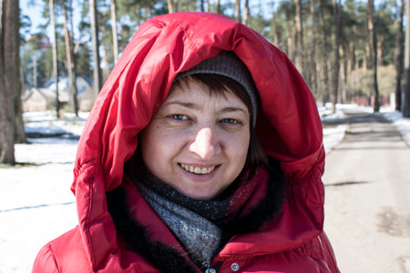 girl in a red jacket outdoor