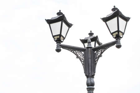 Black metal lantern with two tourist sign in aの写真素材