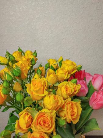 bouquet of flowers roses and two tulips in one