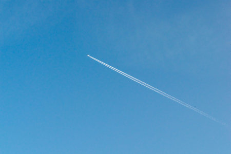 background texture plane flying on a background of blue sky in spring